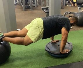 Stability work on a balance trainer at APX Fitness