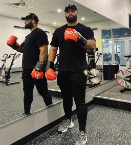 Conditioning work with boxing gloves at APX Fitness